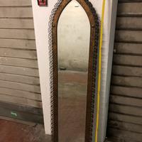 Specchio con cornice in bronzo