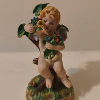 Statuetta Putto in Porcellana Capodimonte - Marchi