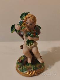 Statuetta Putto in Porcellana Capodimonte - Marchi