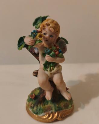 Statuetta Putto in Porcellana Capodimonte - Marchi