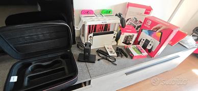 Nintendo Switch OLED + 2 Joycon extra + Accessori