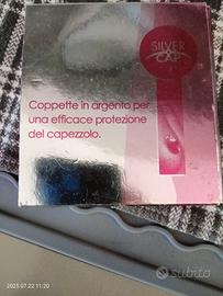 paracapezzoli in argento 