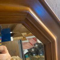 Specchio con cornice in legno