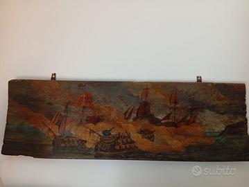 Scena di battaglia su legno. 