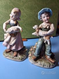 Statuine porcellana Capodimonte una con difetto 