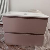 Mobile bagno rosa cipria con lavabo in ceramica