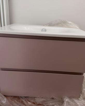 Mobile bagno rosa cipria con lavabo in ceramica