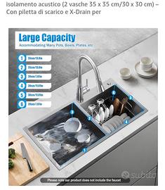 lavandino col suo mobile e rubinetto 