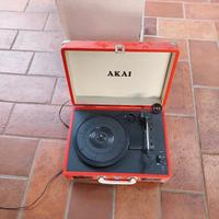 Giradischi portatile e dischi in vinile