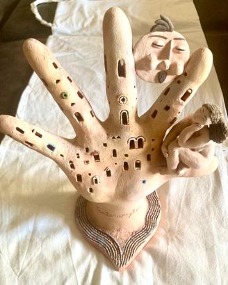 Scultura terracotta Pentedaktylos
