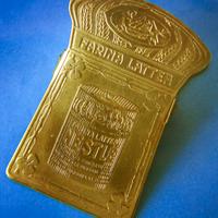 Fermacarte pubblicitaria Nestlè primi '900