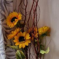 Rami decorativi e girasoli