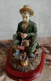STATUINA SOPRAMMOBILE 