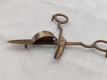 forbici spegni candela 