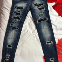 Jeans donna con toppe in pizzo