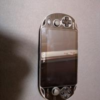 Ps Vita OLED + God war collection e Uncharted 