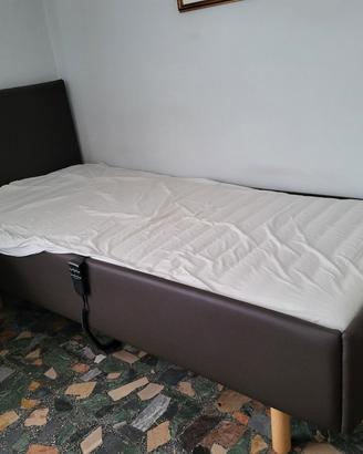 Letto con rete motorizzata 