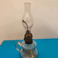 Piccola lampada a olio in vetro trasparente