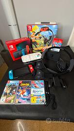 Nintendo Switch completa 3 giochi,ring fit e cover