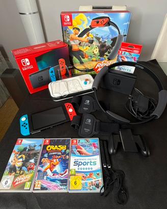 Nintendo Switch completa 3 giochi,ring fit e cover