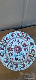 piatto decorativo in ceramica firmato Volpi Deruta