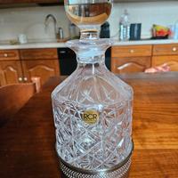 bottiglia liquore in cristallo ,base in argento 
