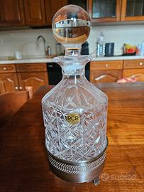 bottiglia liquore in cristallo ,base in argento 