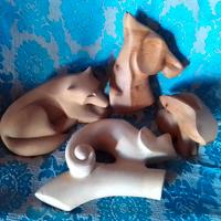 Sculture animali in legno 