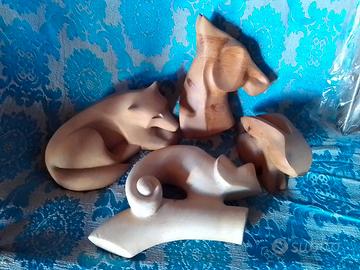 Sculture animali in legno 