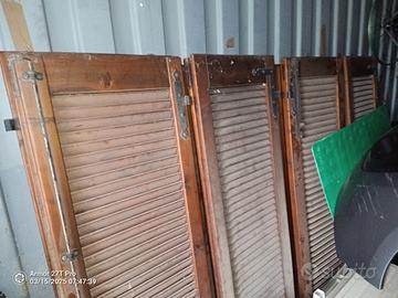 Infissi in alluminio e in legno con persiane