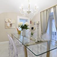 Tavolo in cristallo e base in ferro