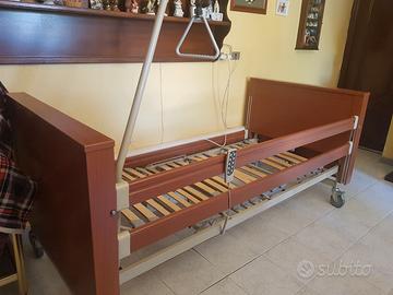 Letto elettrico con sponde per disabili