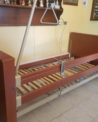 Letto elettrico con sponde per disabili