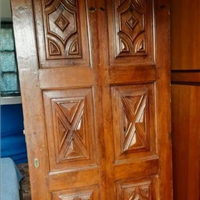 Porta antica in noce intagliata del 600