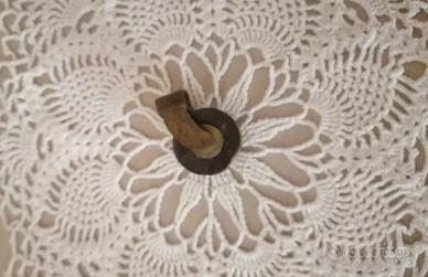 Antica rotellina in legno e ottone.