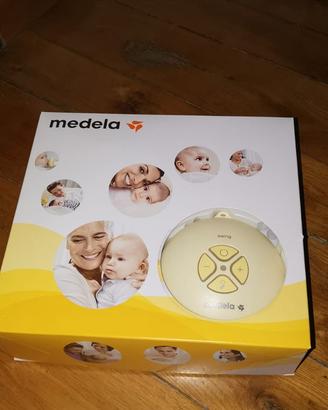 tiralatte medela
