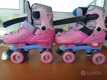 PATTINI A ROTELLE PER BAMBINA 31/34 CON ACCESSORI