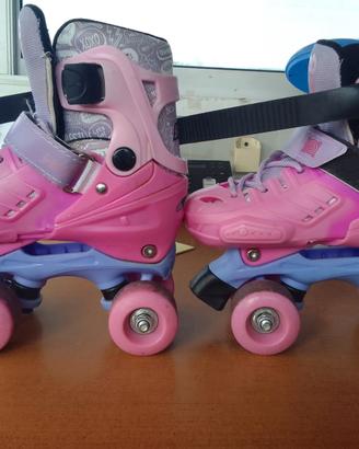 PATTINI A ROTELLE PER BAMBINA 31/34 CON ACCESSORI