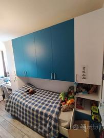 Letto con armadio a ponte