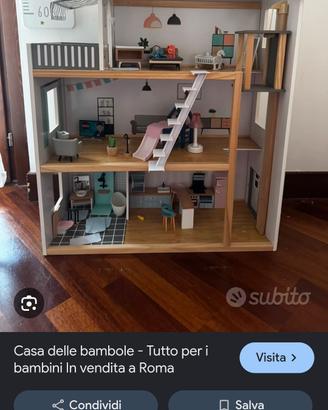 grande casa delle bambole in legno