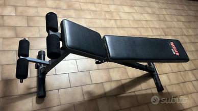 Panca, bilancieri e dischi per un homegym