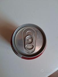 Lattina Coca Cola sigillata e vuota settembre 1999