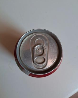 Lattina Coca Cola sigillata e vuota settembre 1999