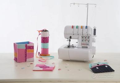 Macchina tagliacuci , machina da cucire