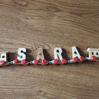 Trenino di lettere in legno