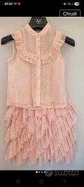 Vestito elegante da cerimonia rosa. 