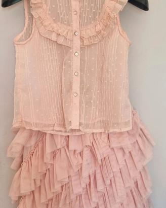 Vestito elegante da cerimonia rosa. 