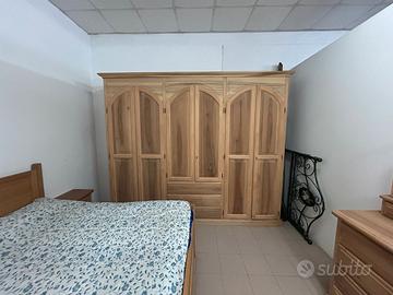 camera da letto in noce nazionale grezza