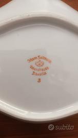 Servizi piatti d'epoca.