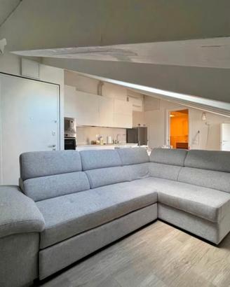 Divano letto angolare con pouf